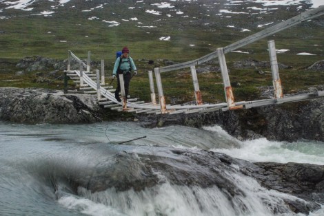 Crossing a bridge in Norwegian Mountains